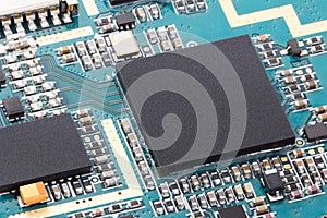 Closeup of electronic chip computer on circuit board with processor cpu background