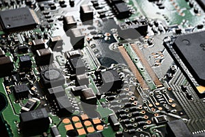 Closeup on electronic circuit board with components and semiconductors