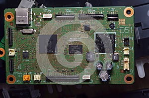 Closeup electronics circuit board and components printer computer