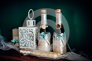 Closeup of elegant stylish brown male accessories  on white wooden background. Top view of bow-tie, belt, shoes