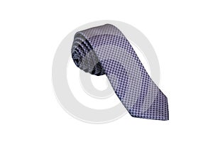 Closeup of an elegant stylish tie rolled and isolated on a white background