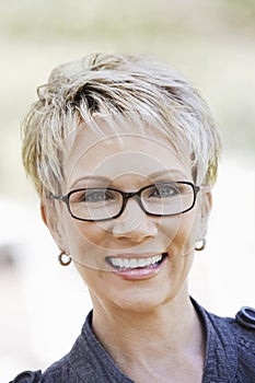 Closeup Of Elegant Woman Wearing Glasses