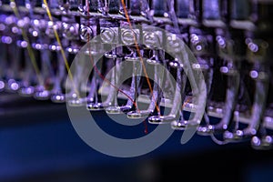 Closeup on Embroidery machine needle in Textile Industry at Garment Manufacturers, Embroidery needle, Needle with thread (