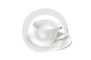 Closeup of an empty cup of coffee and a plate