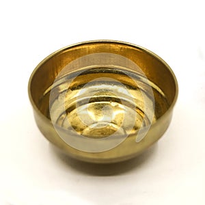closeup of empty gold bowl plate used in the kitchen
