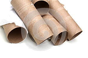 Closeup of empty toilet rolls on white background