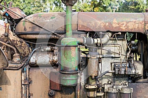 Closeup of the engine of an old tractor