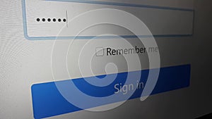Closeup entering password. Someone entering their password on a computer screen. Log in to your account