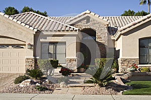 Closeup of entryway of modern adobe home photo