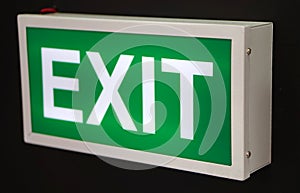 Exit sign, electrically operated glowing cabinet in a public place
