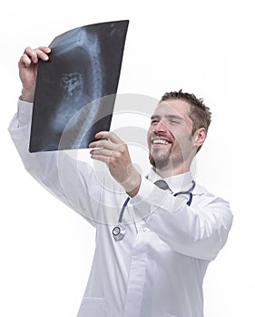 Closeup of an experienced physician examining x-ray