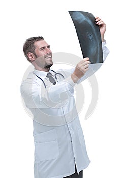 Closeup of an experienced physician examining x-ray