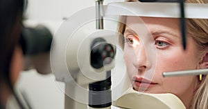 Closeup, eye exam or slit lamp in ophthalmology, optometry or visual healthcare assessment in clinic. Doctor, patient or