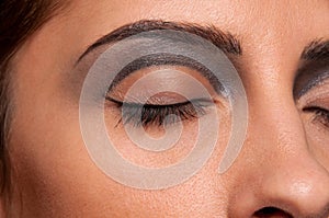 Closeup eye makeup zone of doll woman