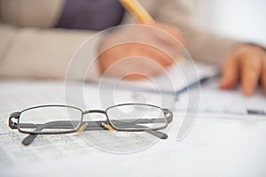 Closeup on eyeglasses on table