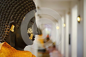 Closeup on the face of Buddha image.