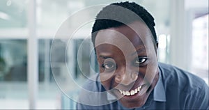 Closeup, face and happy black man in business with smile and pride for startup career in modern office. African person