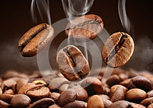 Closeup falling coffee bean with smoke on brown background