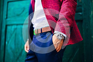 Closeup fashion image of luxury watch on wrist of man.body detail of a business man.