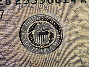Closeup Of Federal Reserve System Seal On Currency