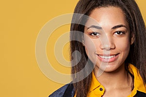 Closeup female face. Smiling African American woman