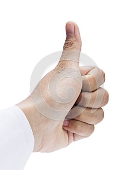Closeup of female hand showing thumbs up sign against white background