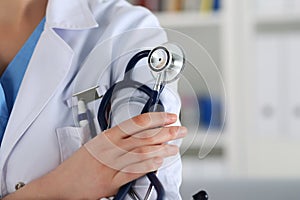 Closeup of female medicine therapeutist doctor hands