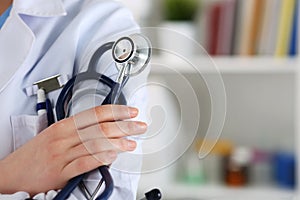 Closeup of female medicine therapeutist doctor hands