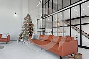 Closeup of Festive Christmas New year decoration in a modern loft interior with black windows and kitche photo