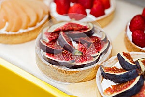 Closeup of fig tart dessert tray assorted