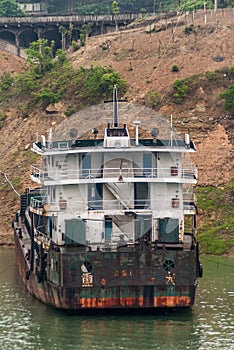 Closeup of Filthy builk carrier along Yangtze river, Baidicheng, China