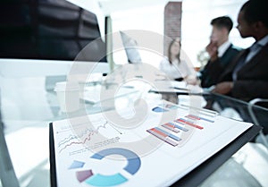 Closeup.financial charts on the Desk of the business team