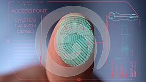 Closeup finger scan failing authorisation for system launch protection sensor photo