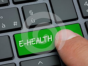 Closeup finger typing on e-health key on computer keyboard