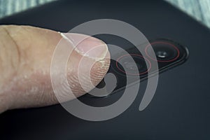 Closeup of a fingerprint reader on a mobile phone