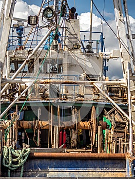 Closeup of fish cutter docked at the port