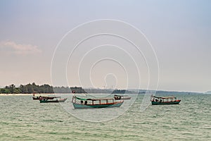 Closeup of Fishing boats off Ochheuteal Beach in Sihanoukville Cambodia