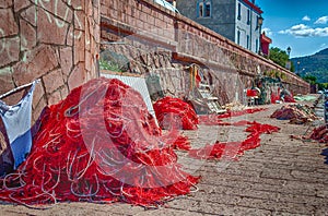 Closeup of fishing net in a harbor