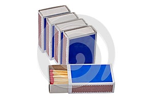 Closeup of five matchboxes with one opened isolated on a white background with copyspace. Clipping path. Savety matches in boxes.