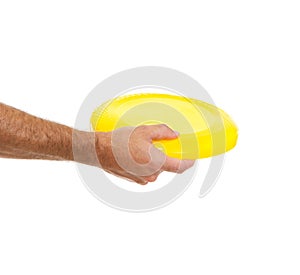 Closeup on flying disc in male hand