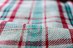 Closeup of a Folded Blanket with Checkered, Plaid Pattern