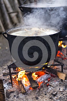 Closeup of food prepared in old cast iron