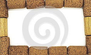 Closeup frame of wine corks on white background.