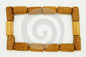 Closeup frame of wine corks on white background.