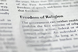 closeup of Freedom of Religion printed in textbook on white page.