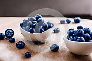 Closeup of fresh blueberries in small white bawls on a table