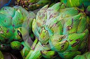 Closeup on Fresh green artichokes in the market