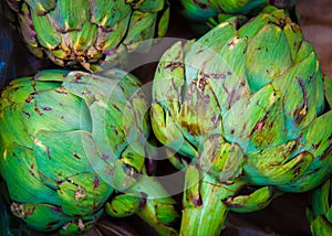 Closeup on Fresh green artichokes in the market