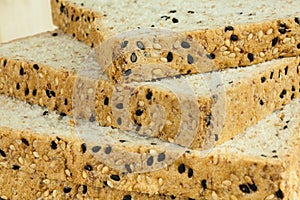 Closeup of Fresh sliced wholewheat bread with various seeds and multigrain