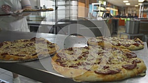 Closeup Freshly Baked Pizza with Cheese and Sausage